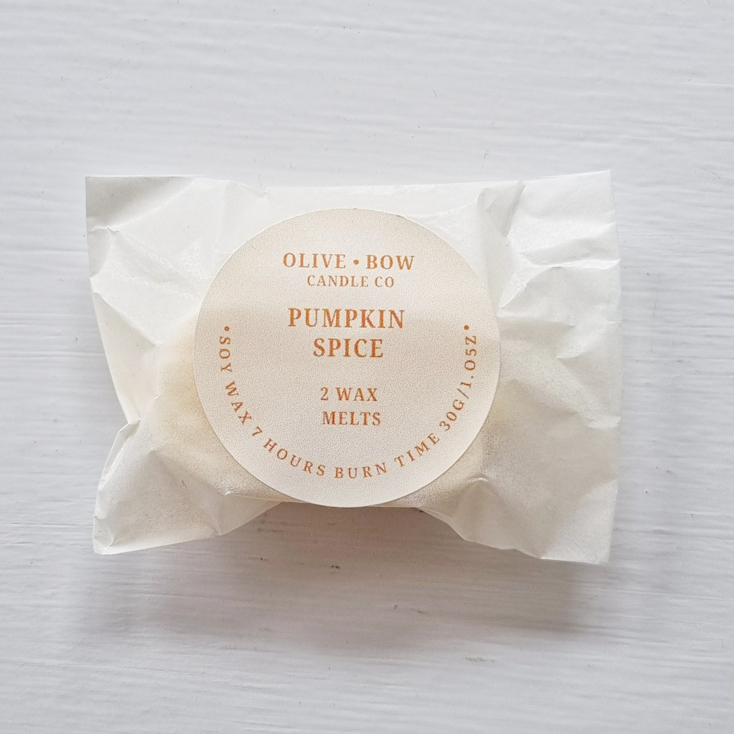 Pumpkin spice wax melts packaging on a white background