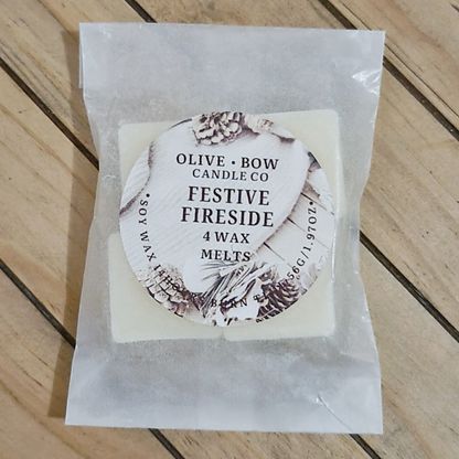 Pack of 4 soy wax melts in the cent Festive Fireside. Made by Olive Bow Candle Co