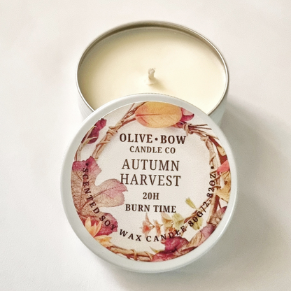 Olive Bow Candle Co autumn harvest soy candle in a tin on a white background
