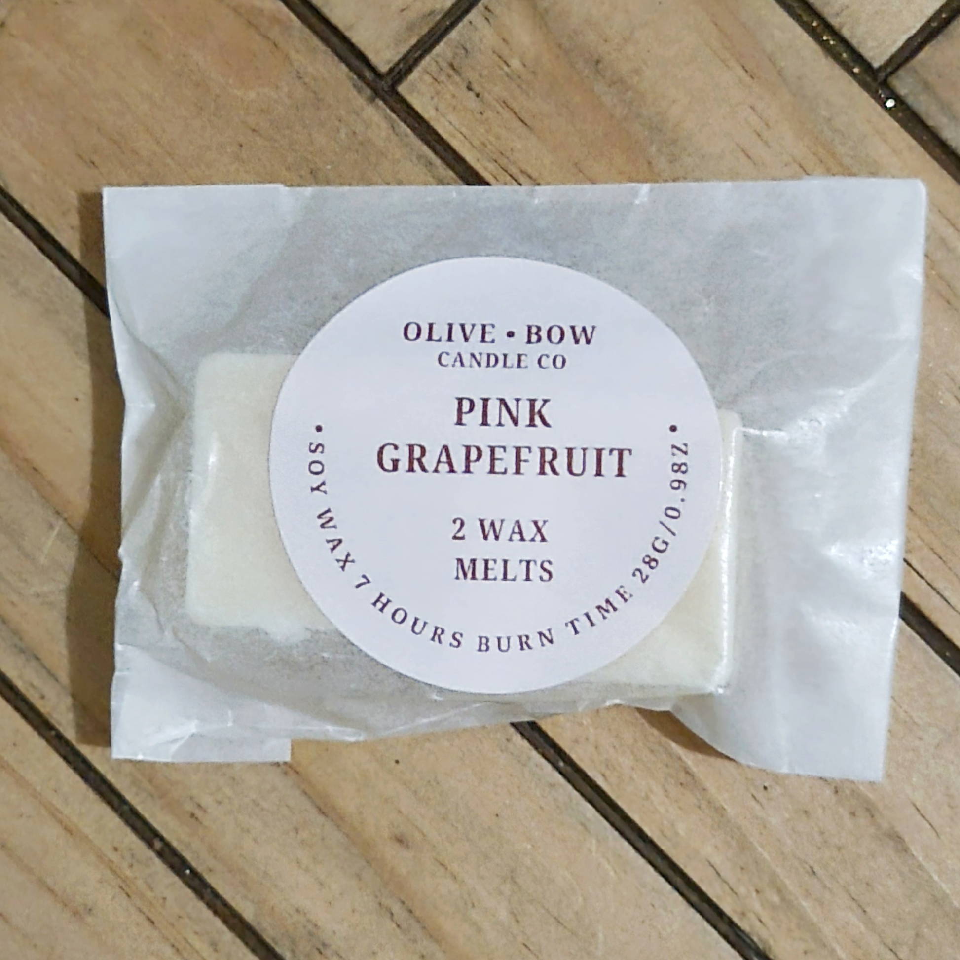 Soy wax melts in the scent Pink Grapefruit, made by Olive Bow Candle Co