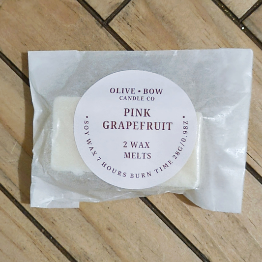 Soy wax melts in the scent Pink Grapefruit, made by Olive Bow Candle Co